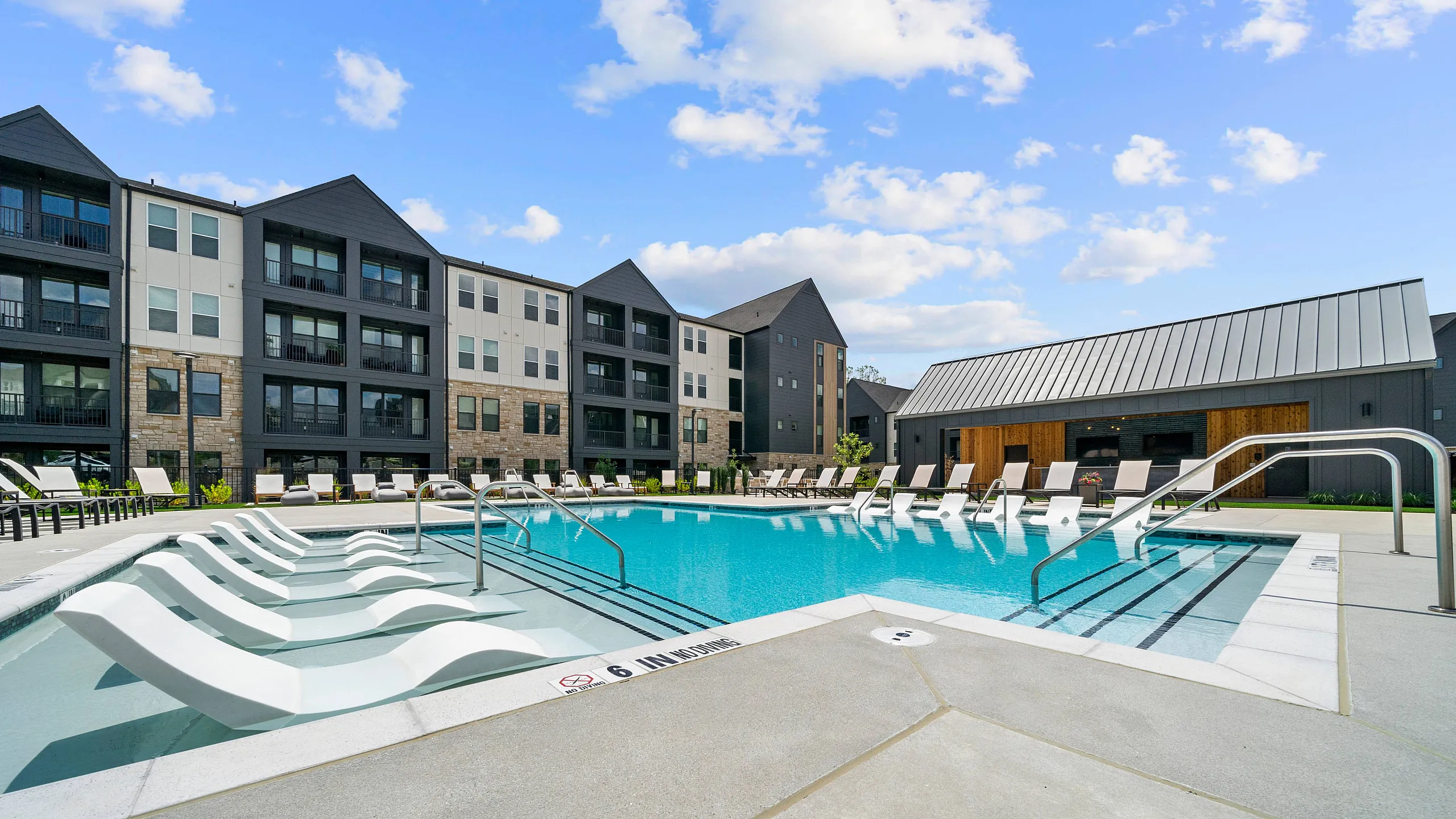 resort style lounge pool with seating