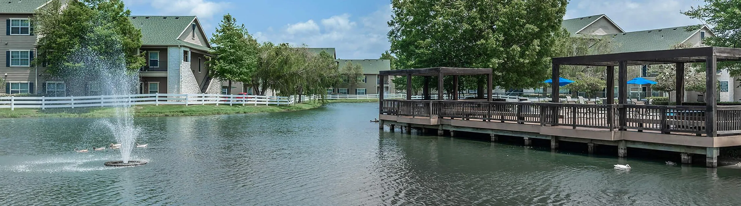 pool overlooking the lake with fountain