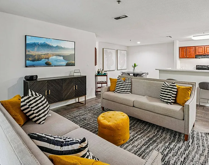 spacious living room with open kitchen
