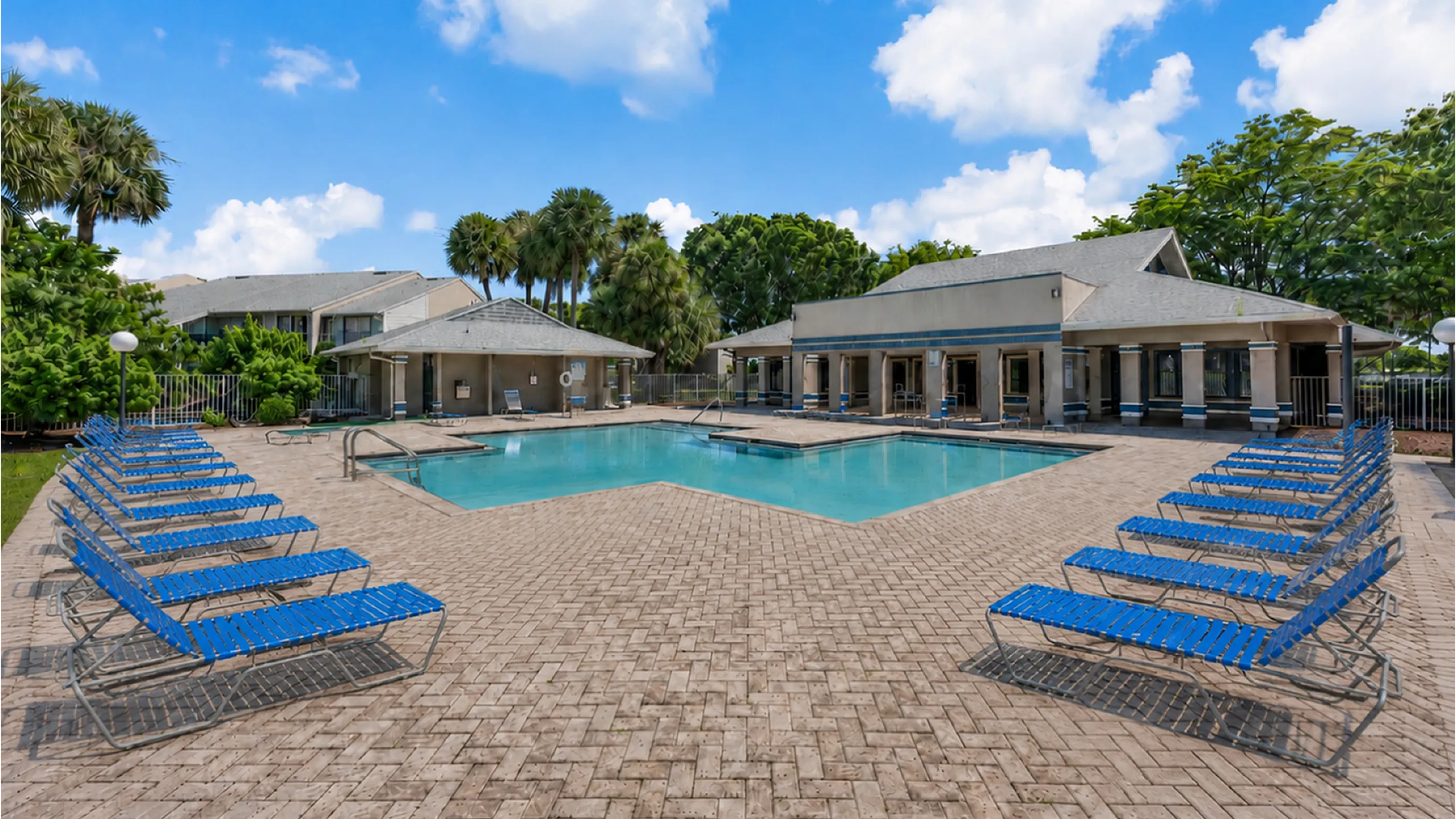 sparkling pool with lounge furnature