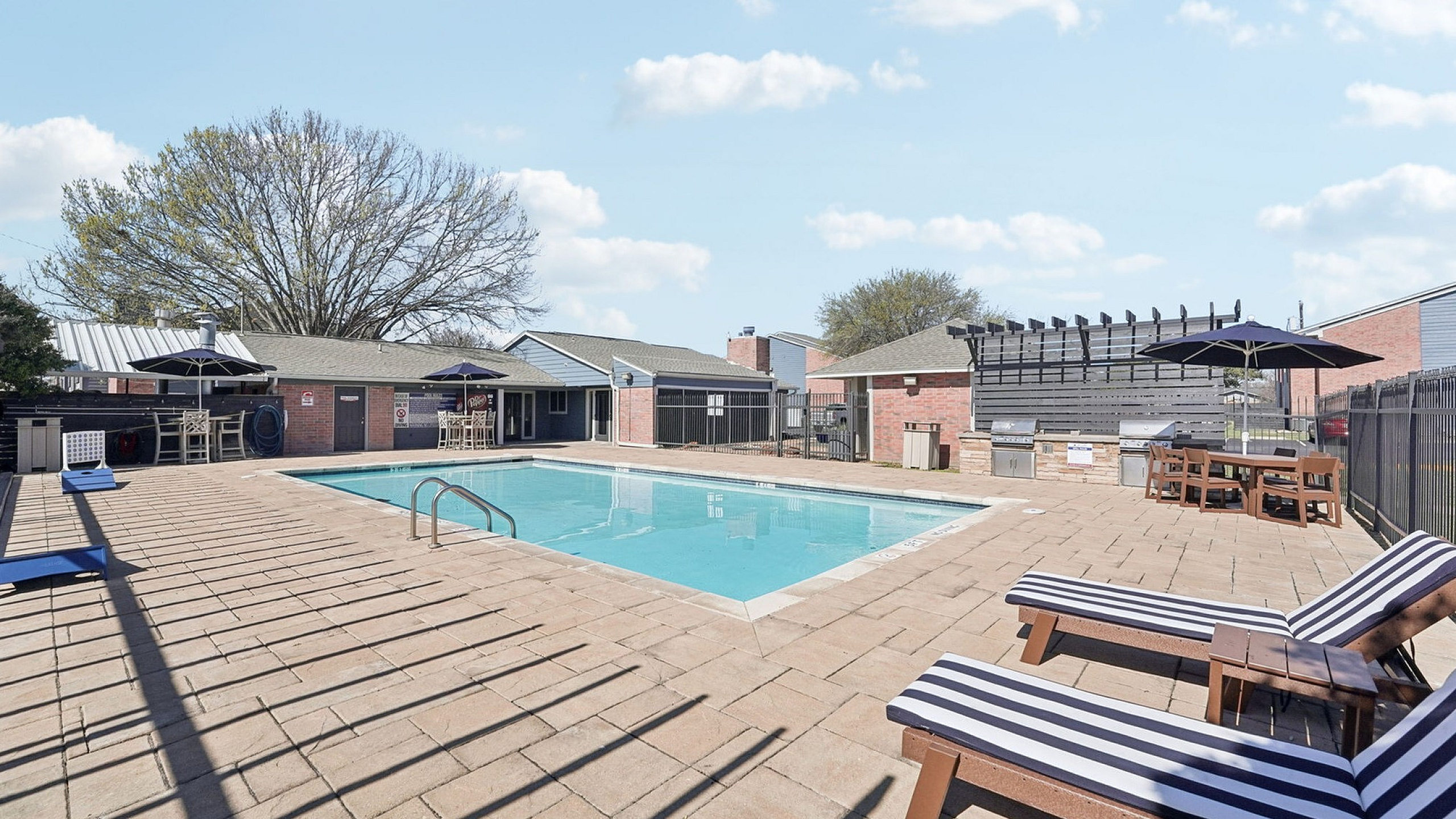 pool with lounge seating
