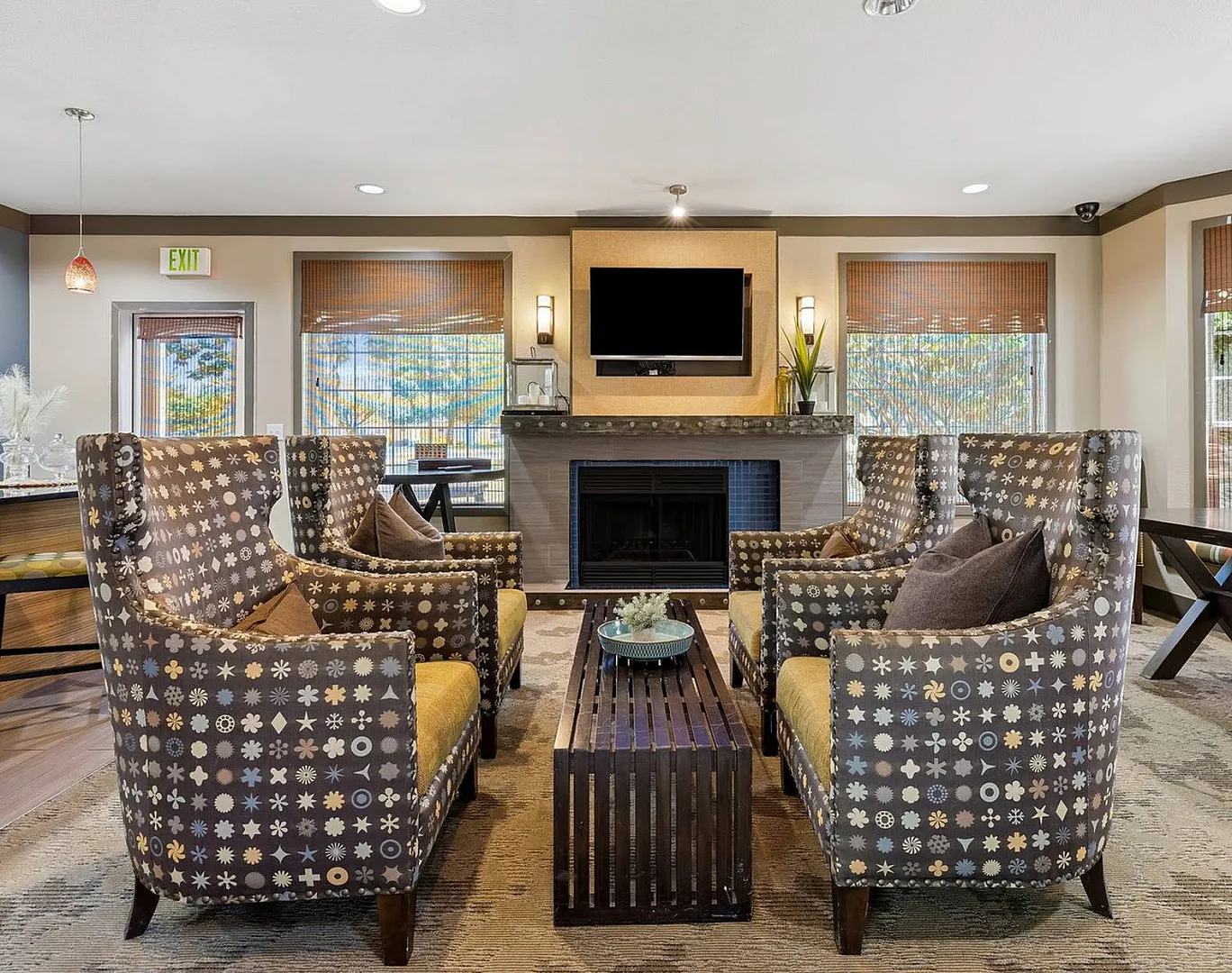 Stylish clubhouse with fireplace and entertainment center