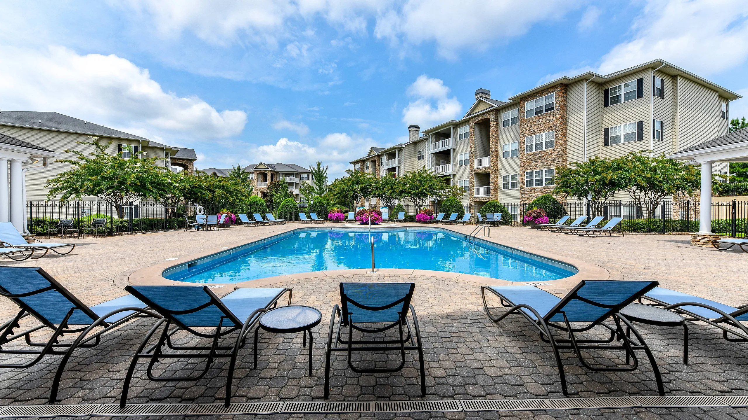 resort style pool with lounge seating