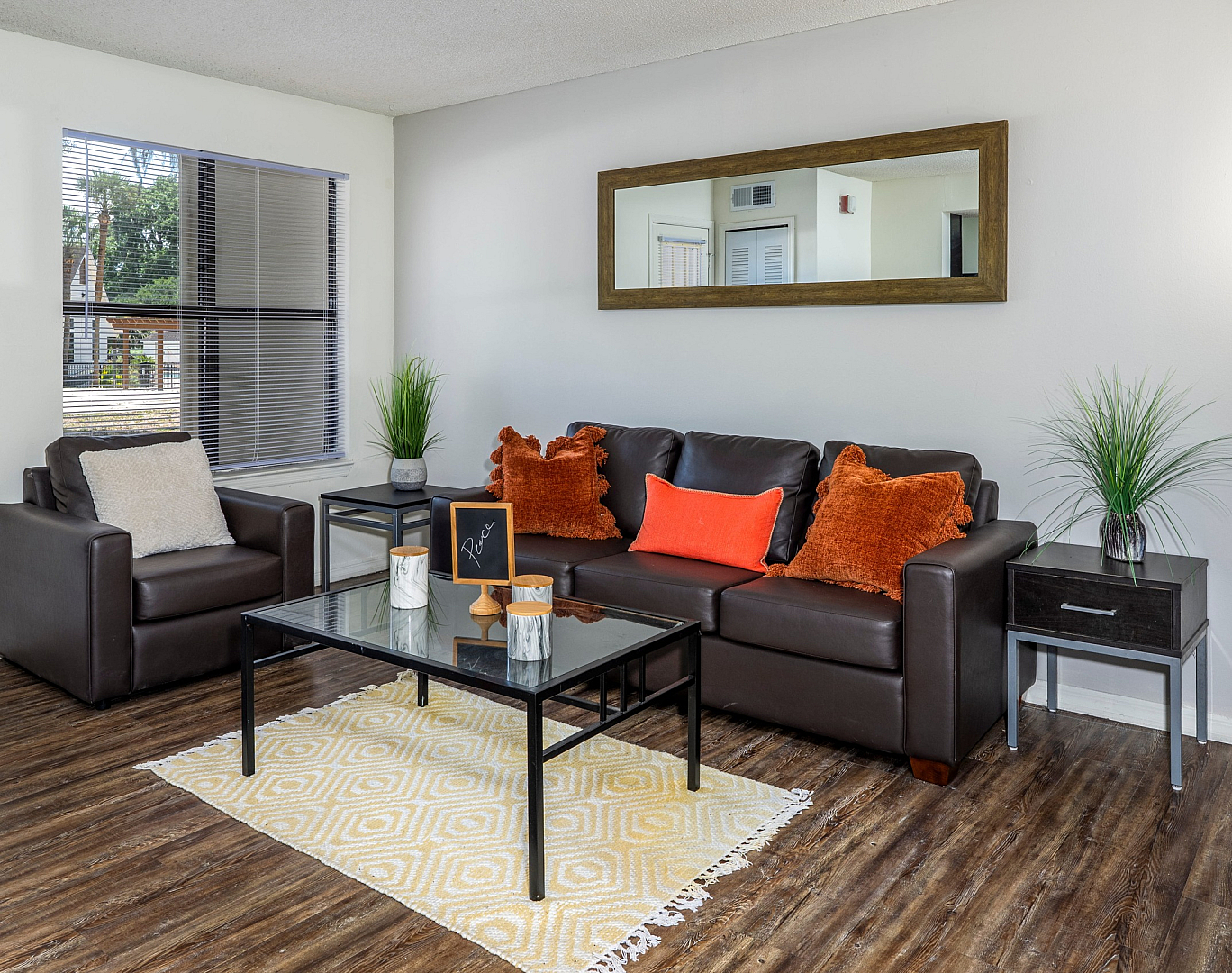 spacious living room with wood style flooring
