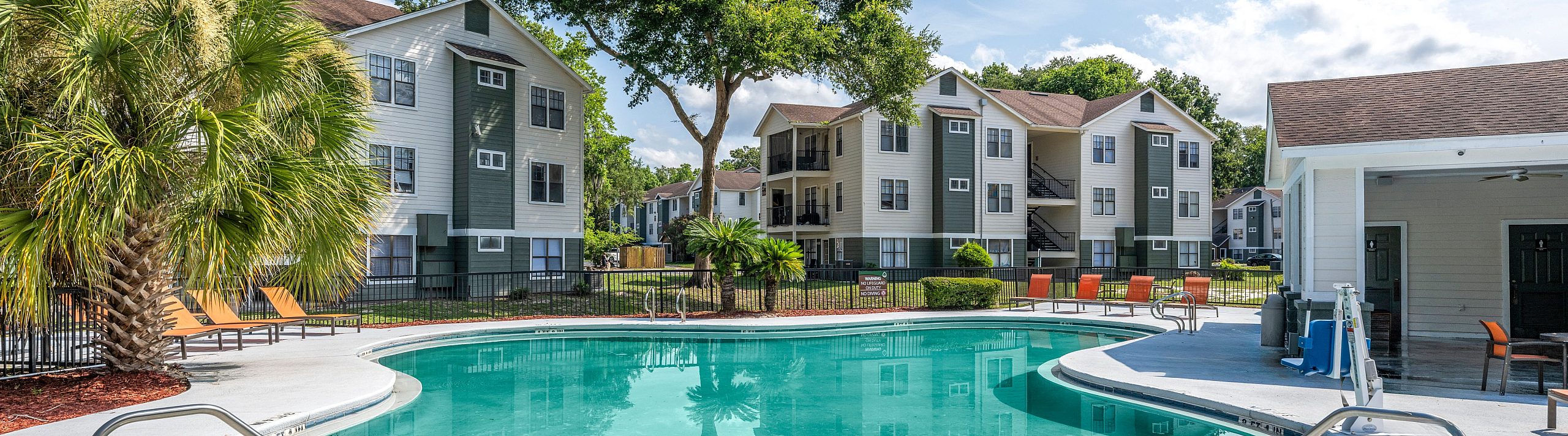 beautiful landscaping beside the pool