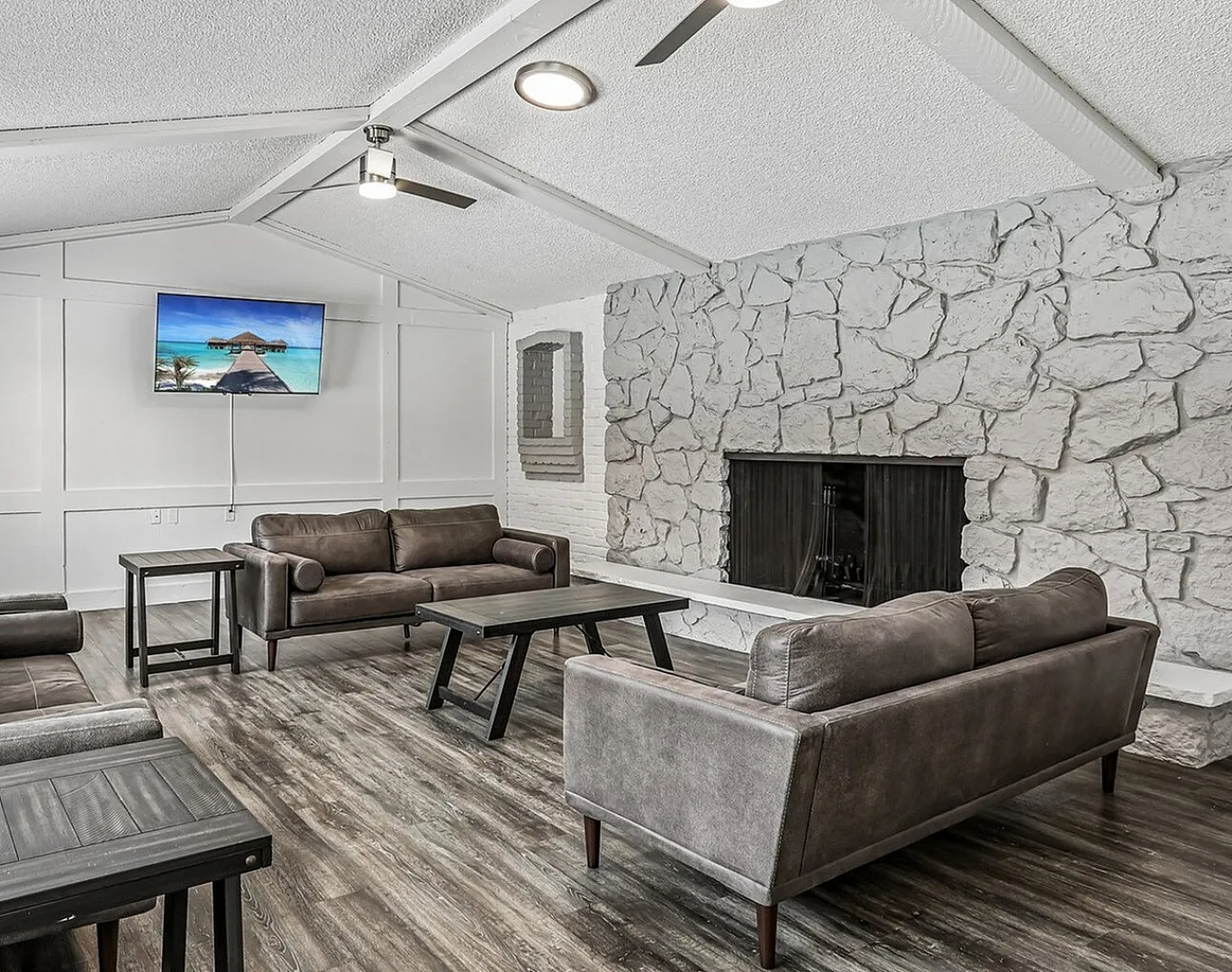 Stylish and modern clubhouse with wood burning fireplace