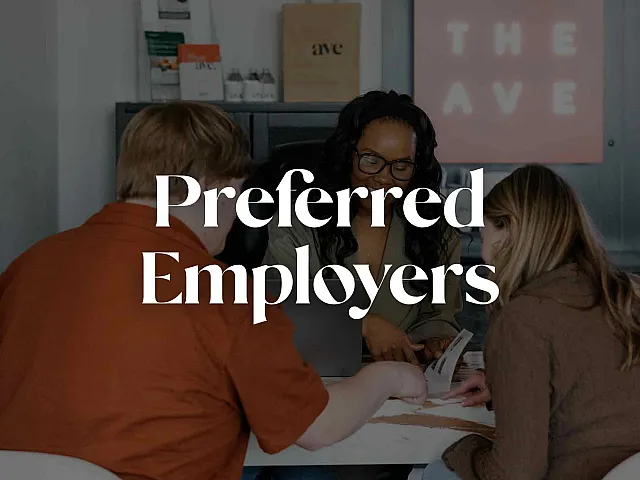 Vibrant workplace meeting with diverse team collaborating around a table, highlighted by 'Preferred Employers' text.