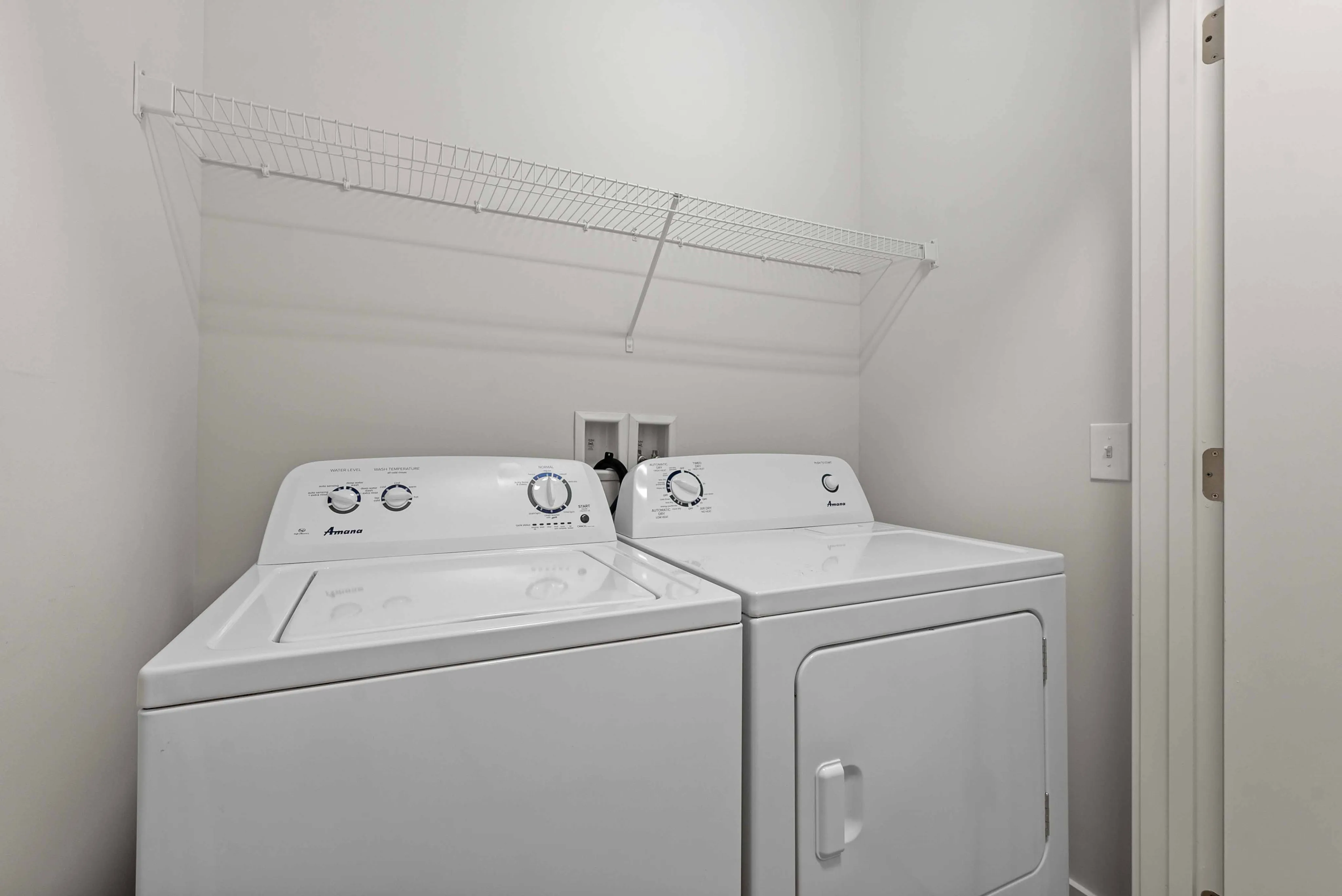 In-unit washer and dryer in modern two-bedroom apartment at The Ave Apartments Clintonville Columbus OH