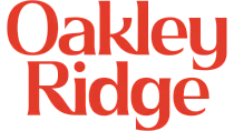 Elegant Oakley Ridge logo in bold red script, perfect for upscale branding.