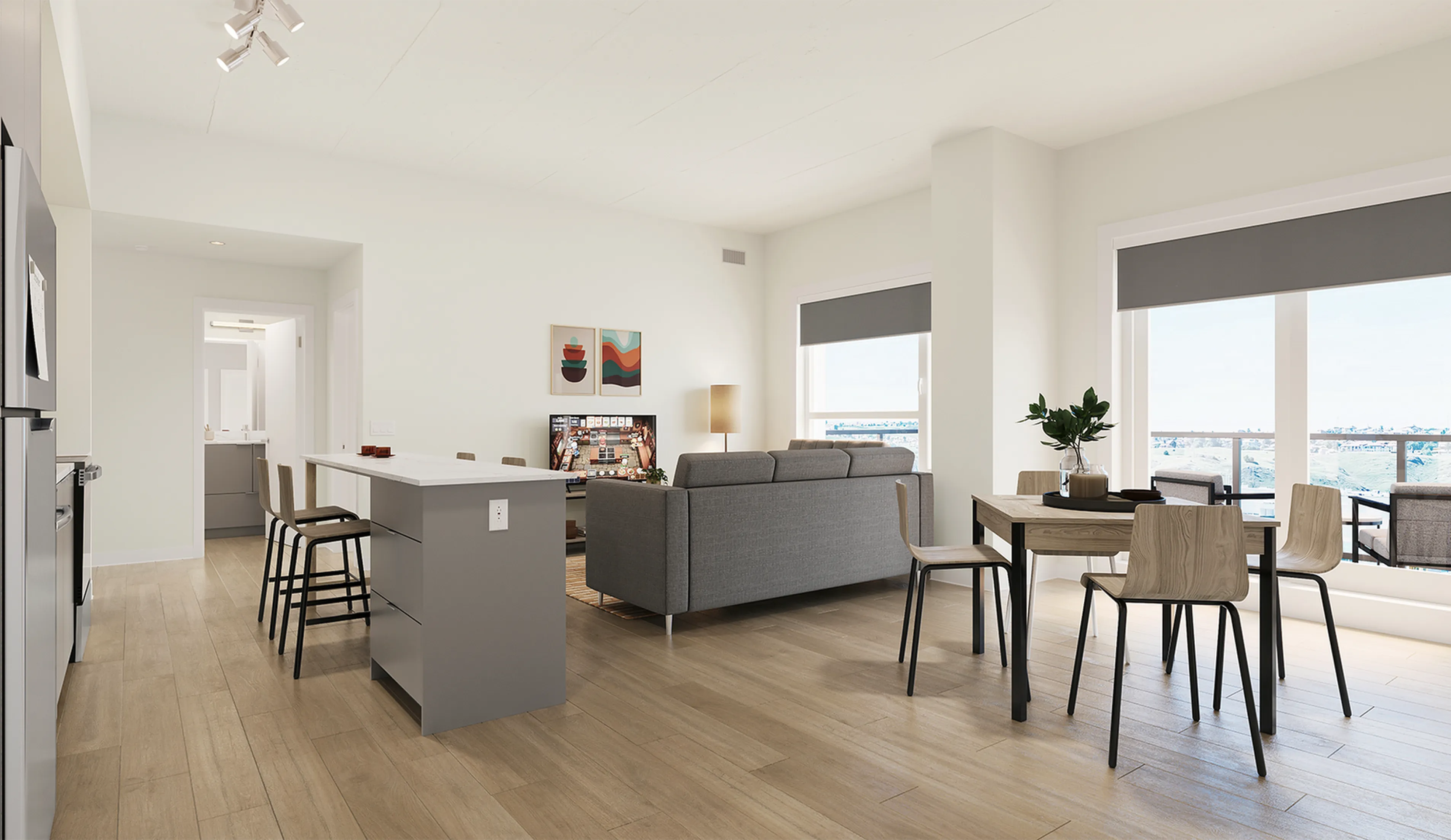 Modern open-plan living area with sleek kitchen island, cozy seating, natural lighting, and scenic balcony views.