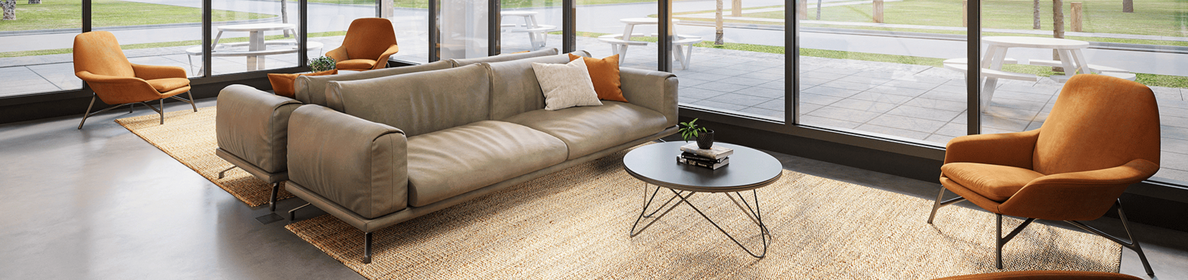 Luxurious living room with modern furniture, floor-to-ceiling windows, and views of lush greenery, creating a serene retreat.