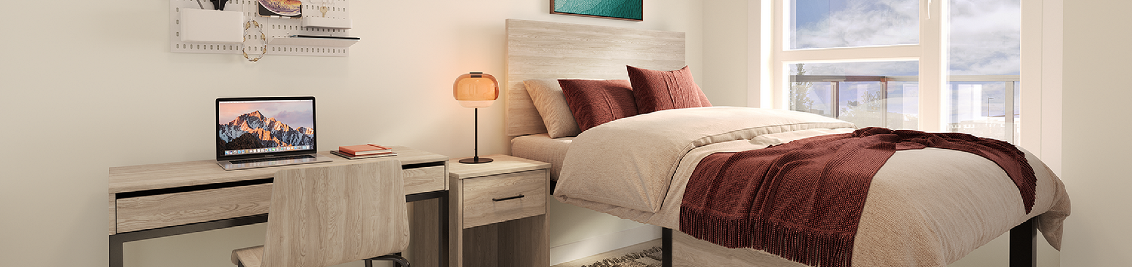 Cozy bedroom with modern decor, featuring a comfortable bed, sleek desk with a laptop, and scenic views from a large window.
