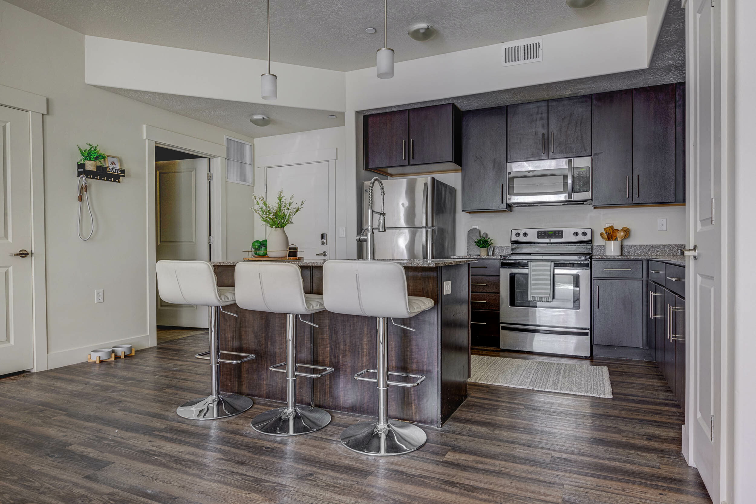 Modern stainless steel appliances in the kitchen at Eaglewood Lofts