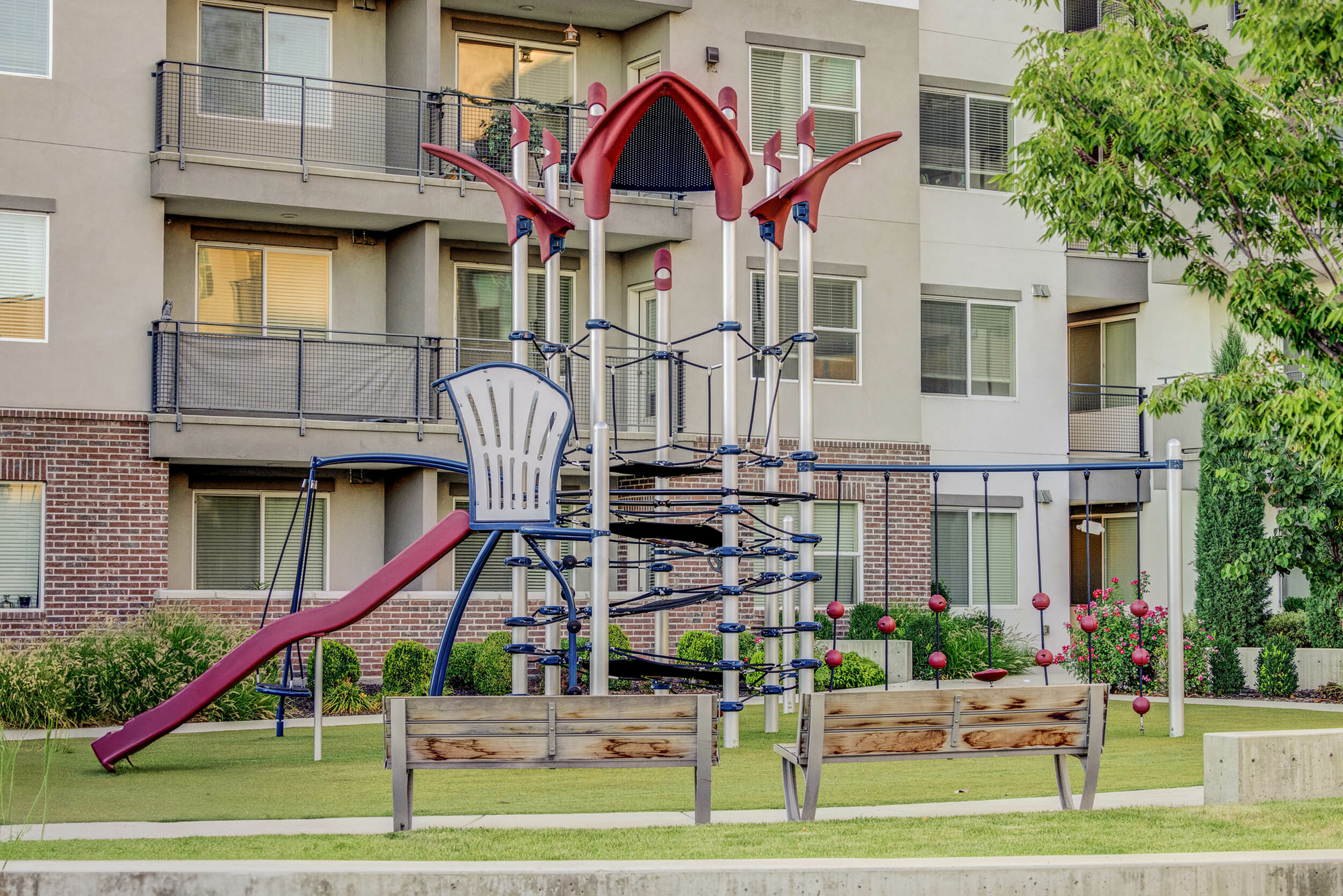 Playground at Parkway Lofts, designed for children and families to enjoy in a safe and fun environment within the Orem community.