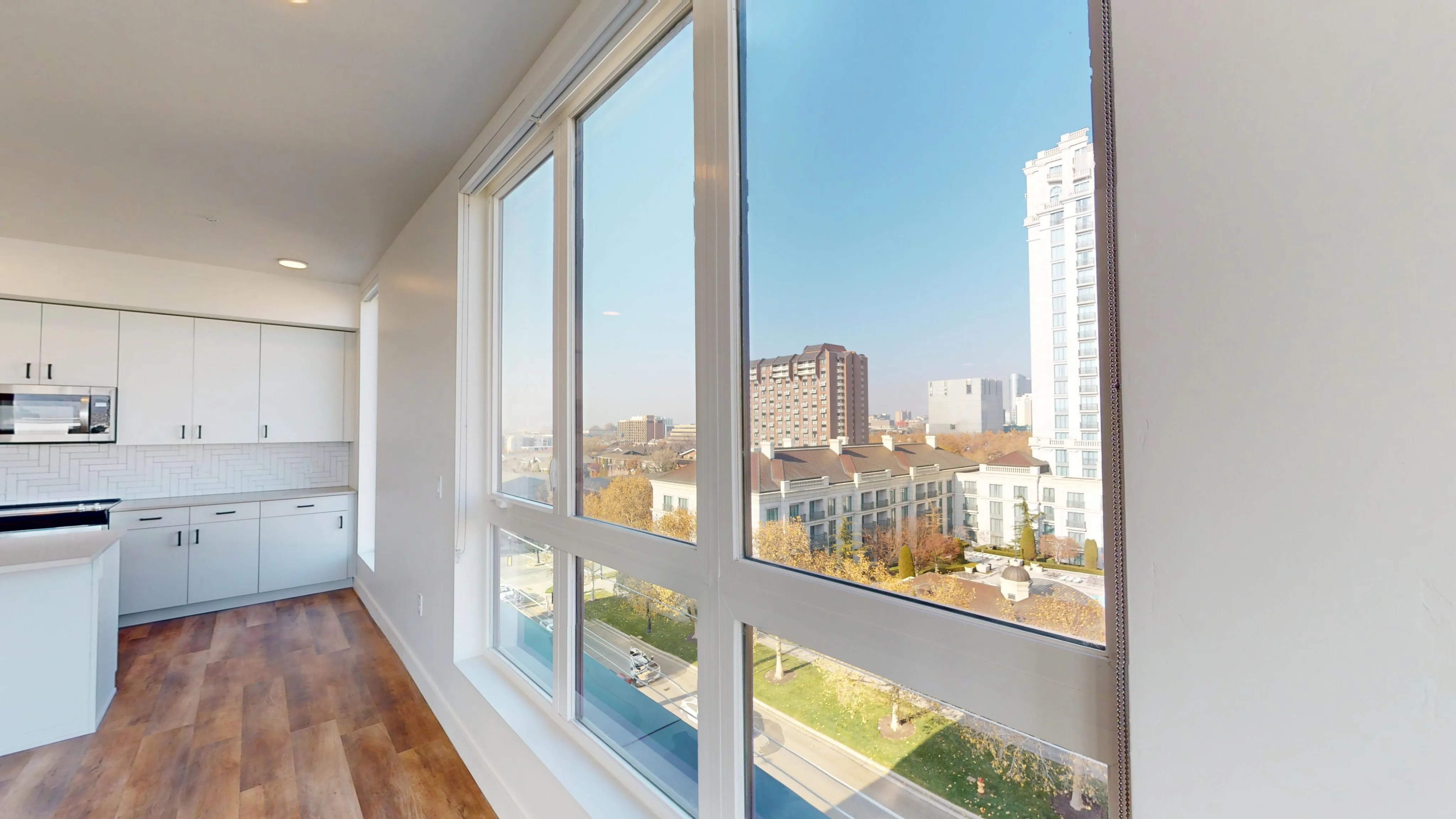 Floor-to-ceiling windows at 6th & Main Apartments in downtown Salt Lake City showcasing natural light and city views.