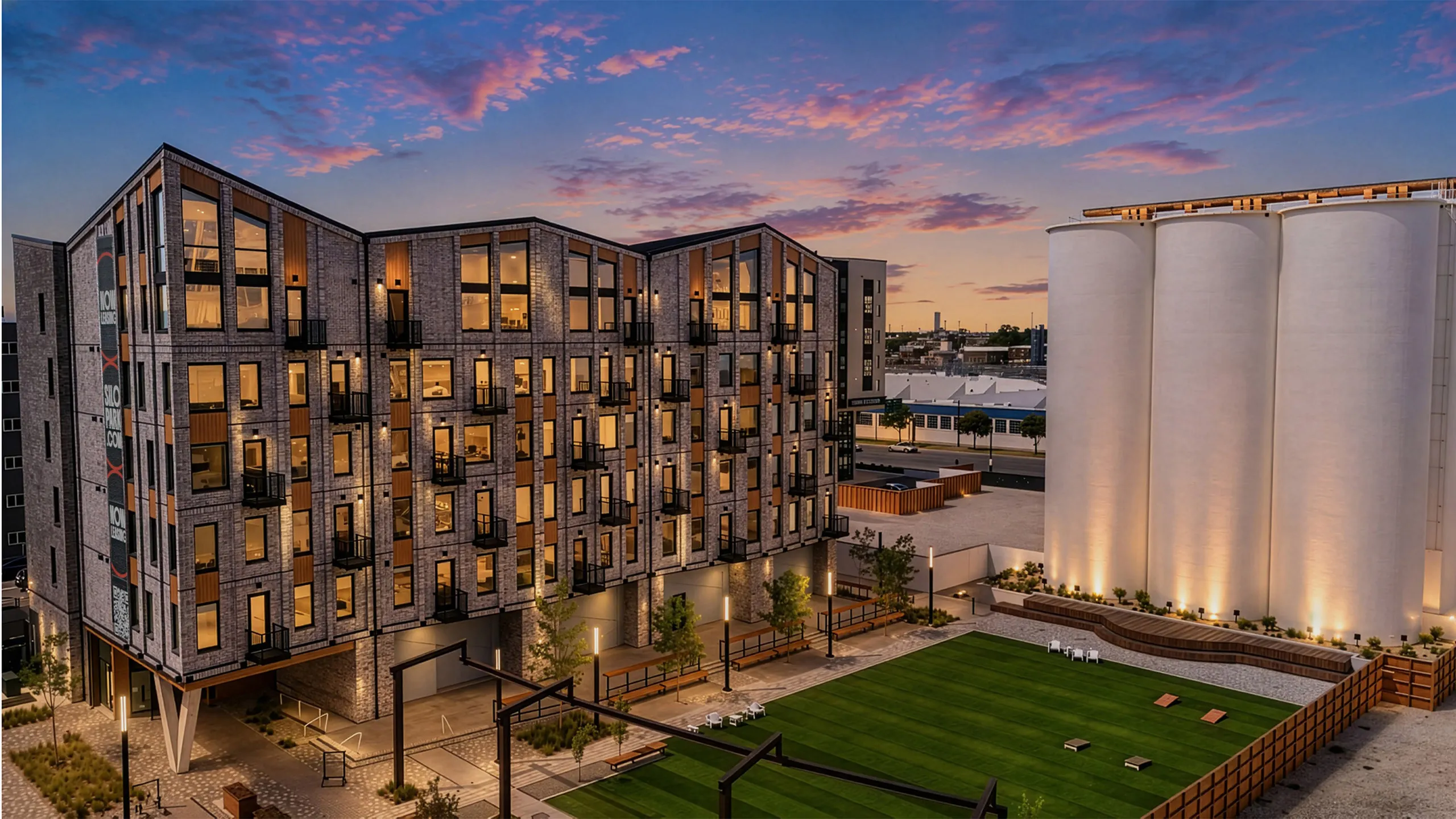 Twilight view of Greenside apartments and Silo Park in Salt Lake City
