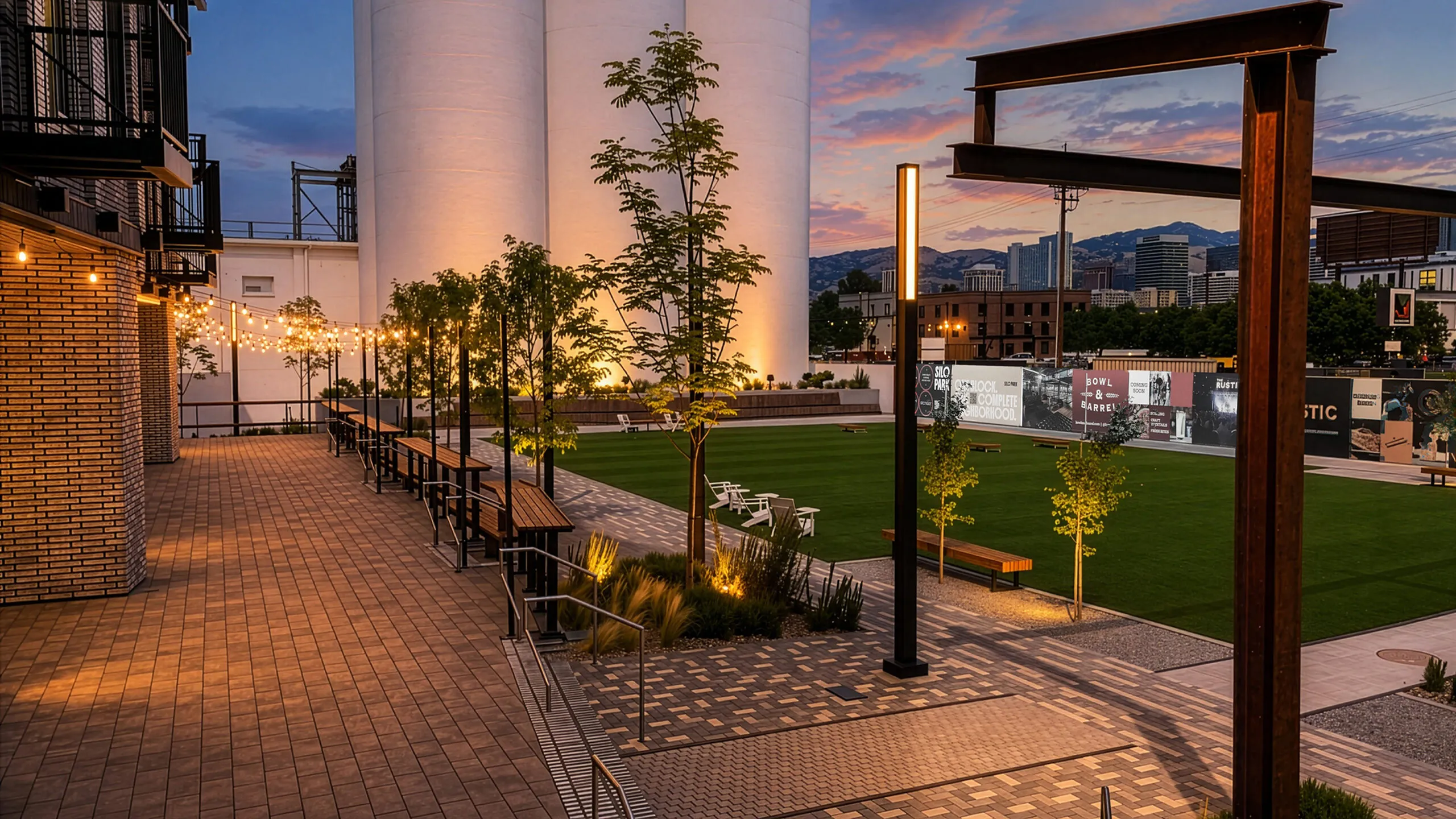Silo Park outdoor gathering space near Greenside apartments at sunset