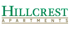 Hillcrest Apartments logo with green and brown lettering