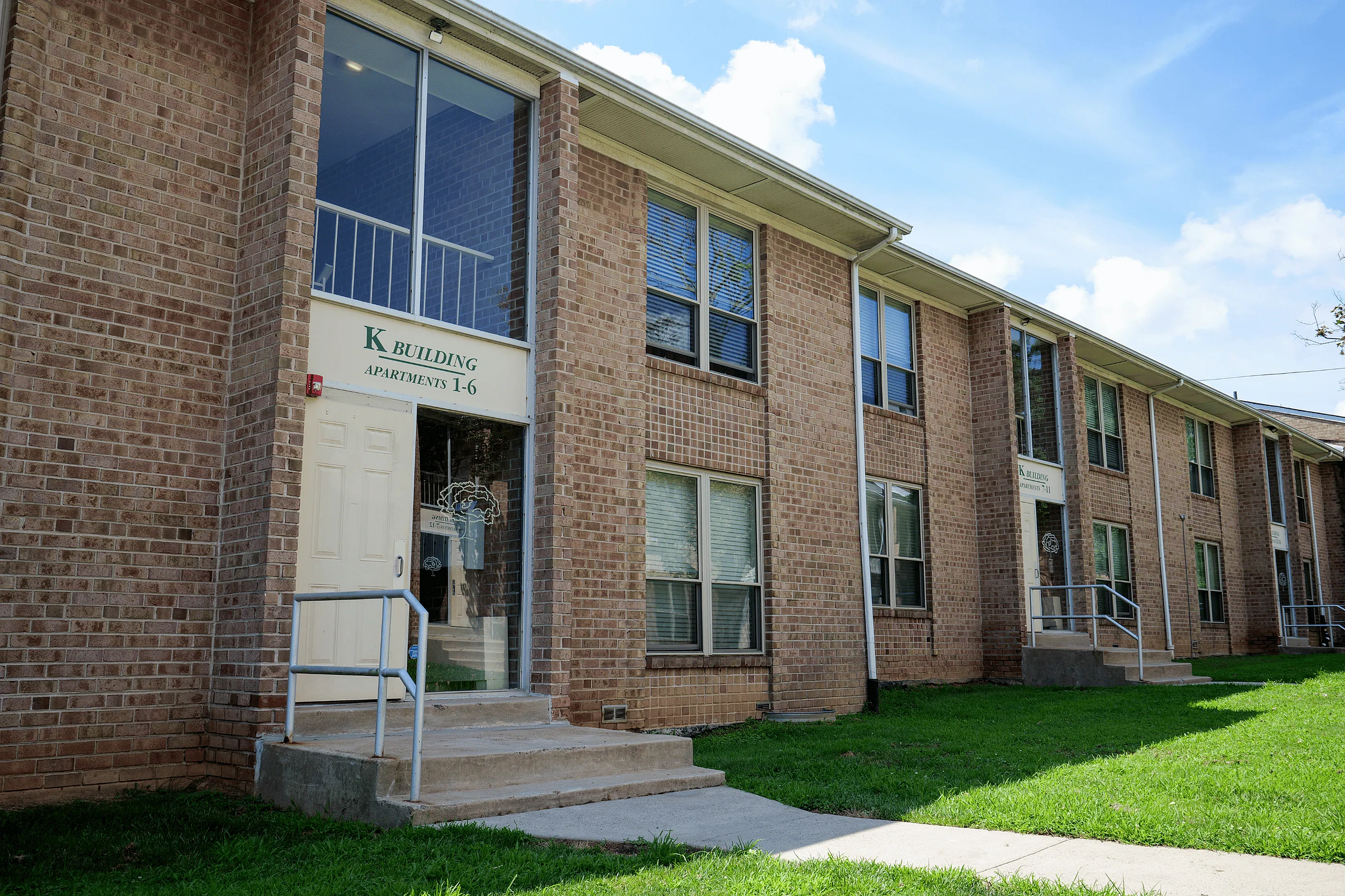 Front view of Woodmere Apartments