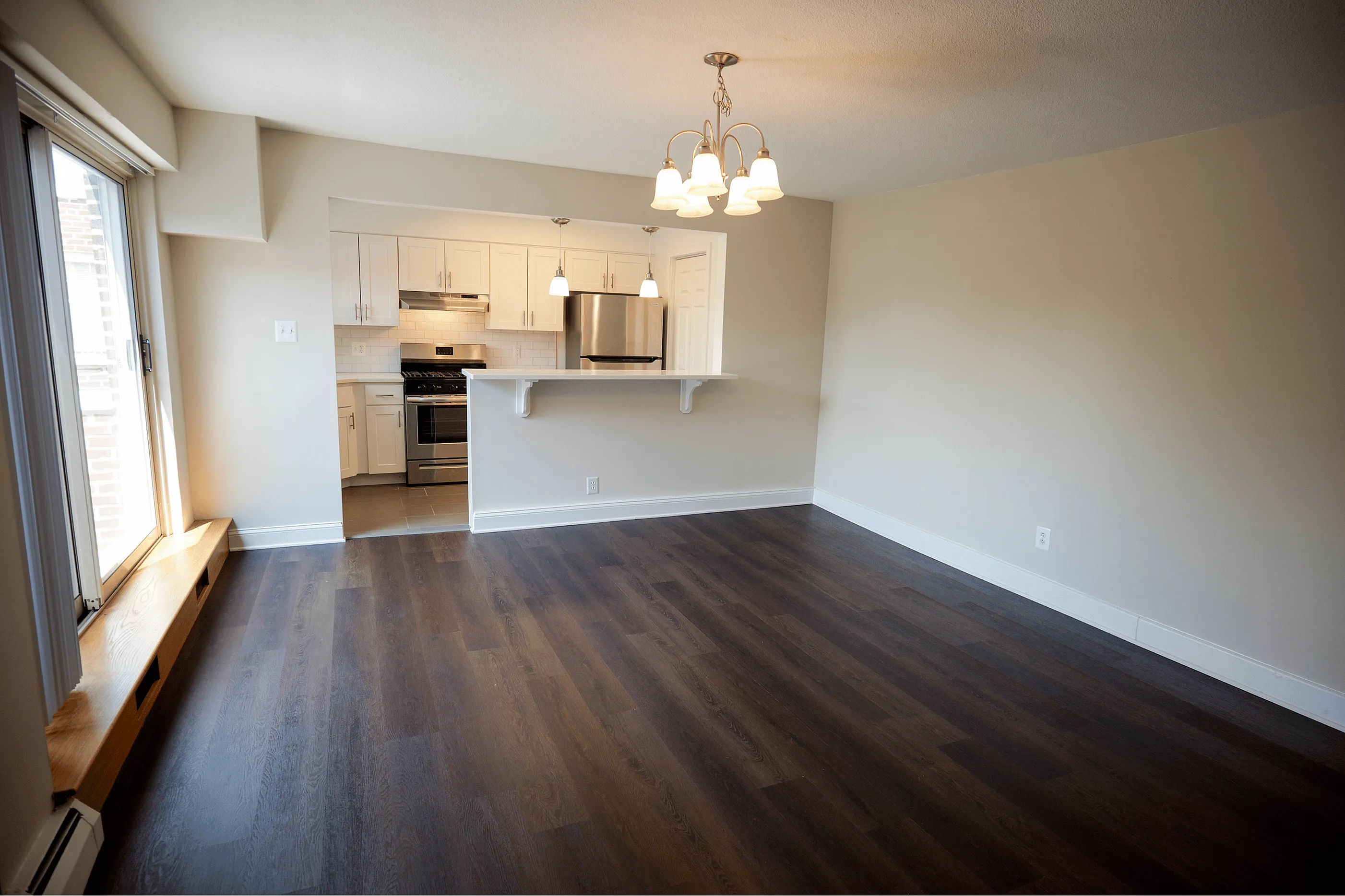 Contemporary kitchen design with ample counter space in Bryn Mawr one‑bedroom