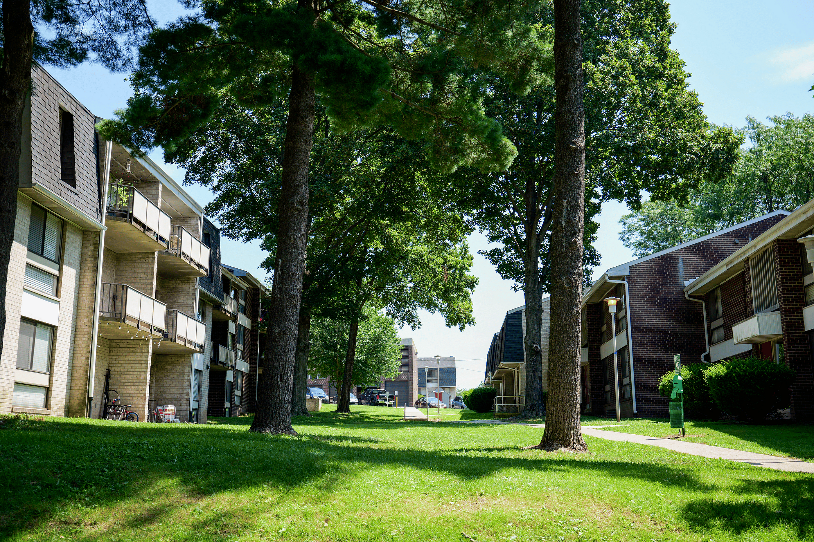 Exterior view of Summit Park Apartments with landscaped grounds