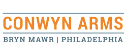 Conwyn Arms logo featuring bold orange and blue typography, highlighting Bryn Mawr, Philadelphia.