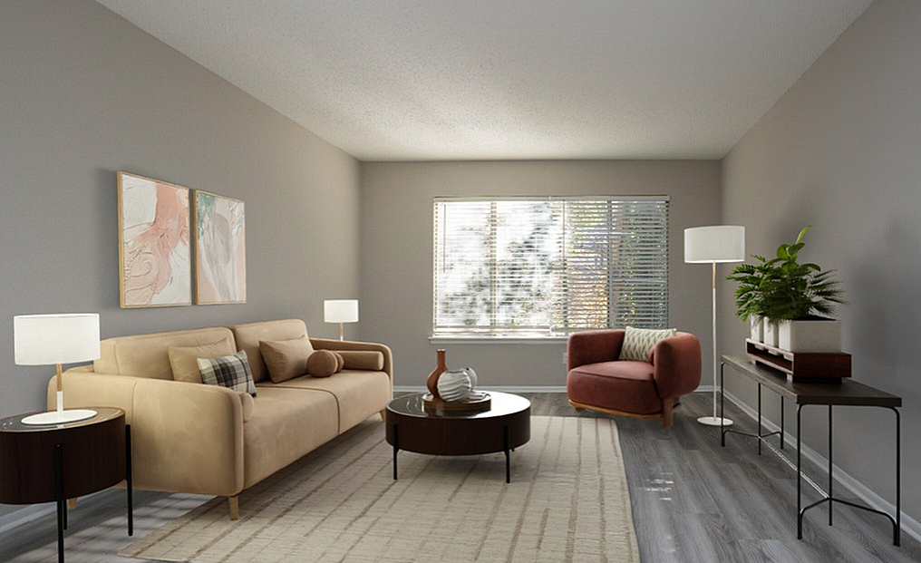 Chic living room with contemporary furniture, natural light, and elegant decor, featuring a comfortable sofa and stylish armchair.