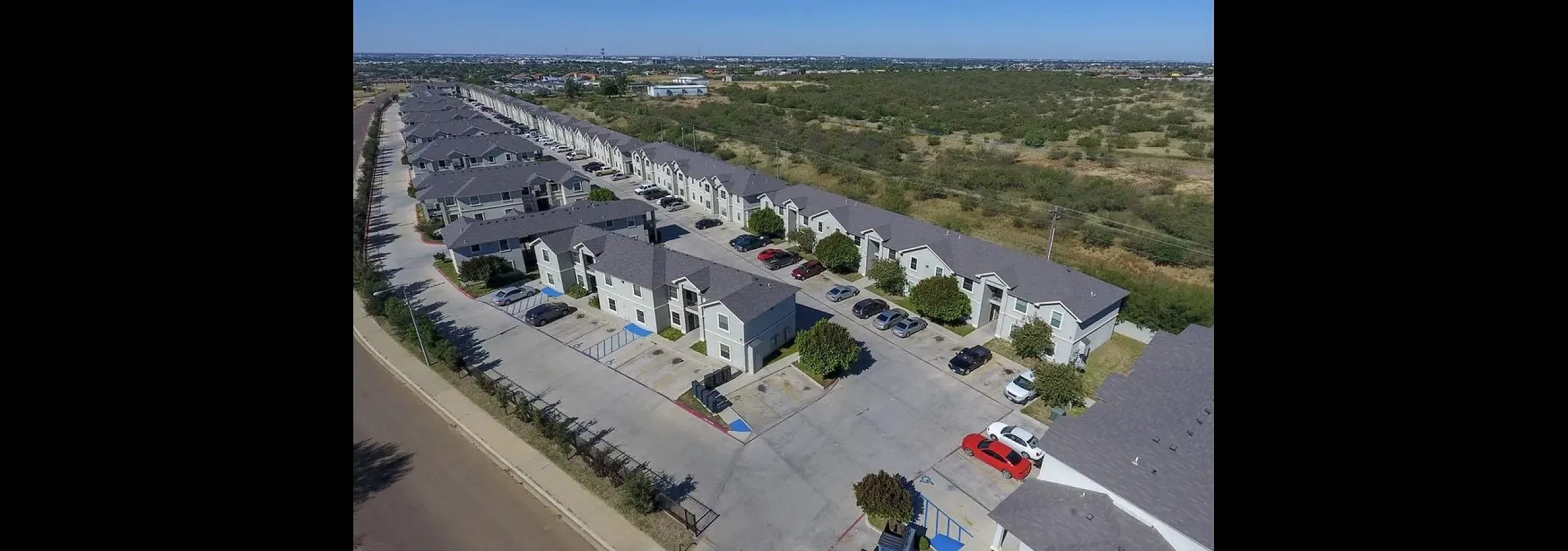 Exterior Aerial Apartment Buildings Side Wide View - La Joya Apartments in Laredo Texas.webp