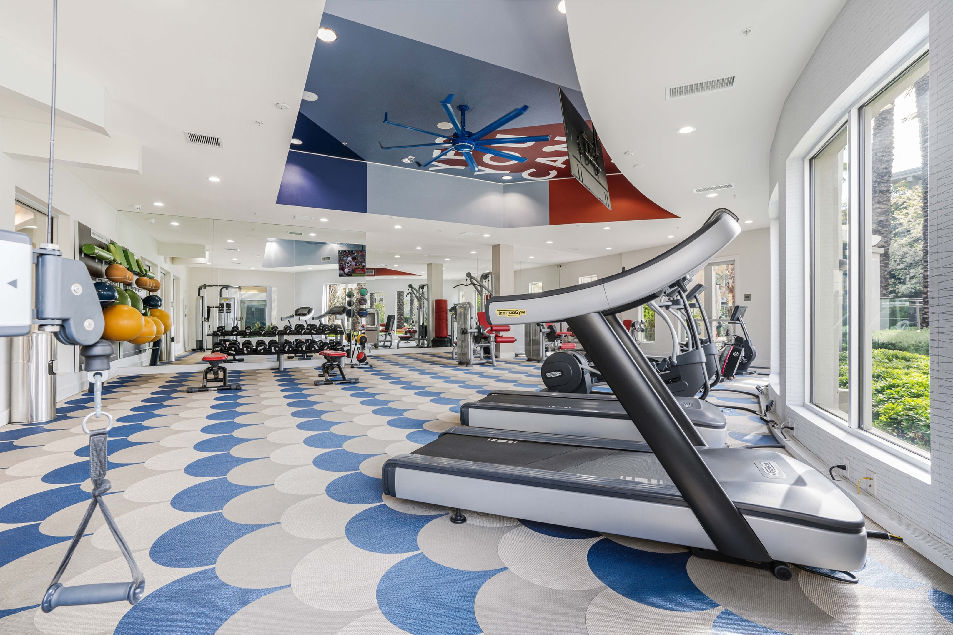 fitness center with treadmills