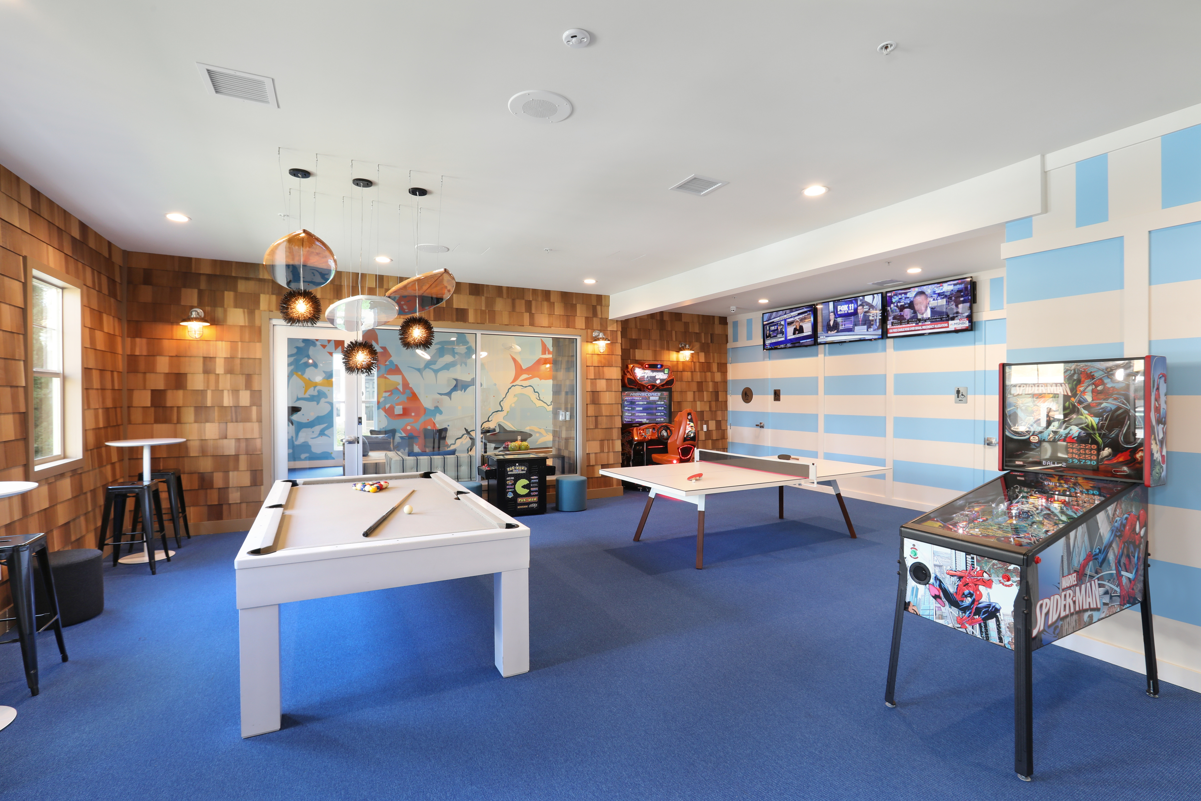 game room with pool tables