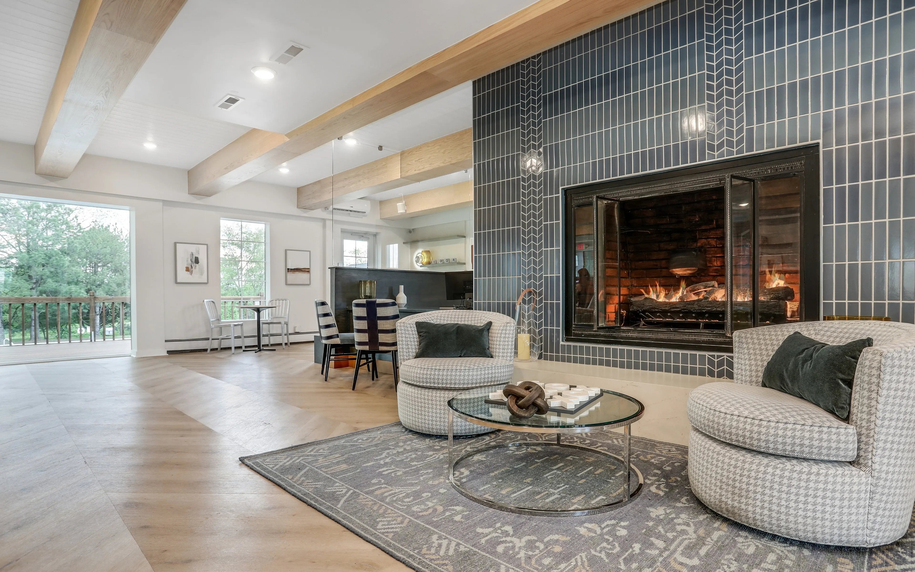 indoor fireplace and lounge seating inside clubhouse