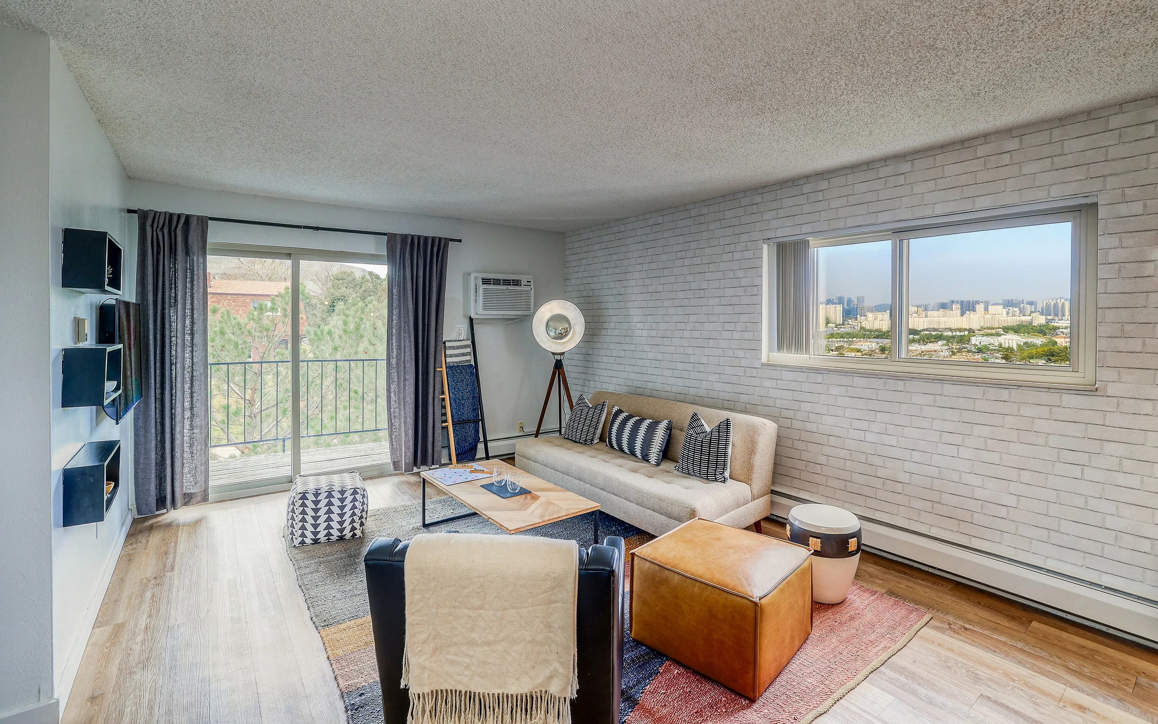 living room with city view seen through window