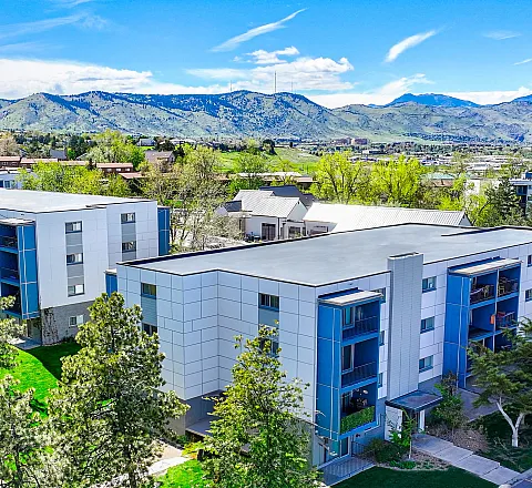 building exterior with mountains in background