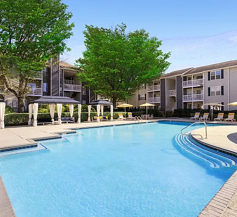pool with buildings in background