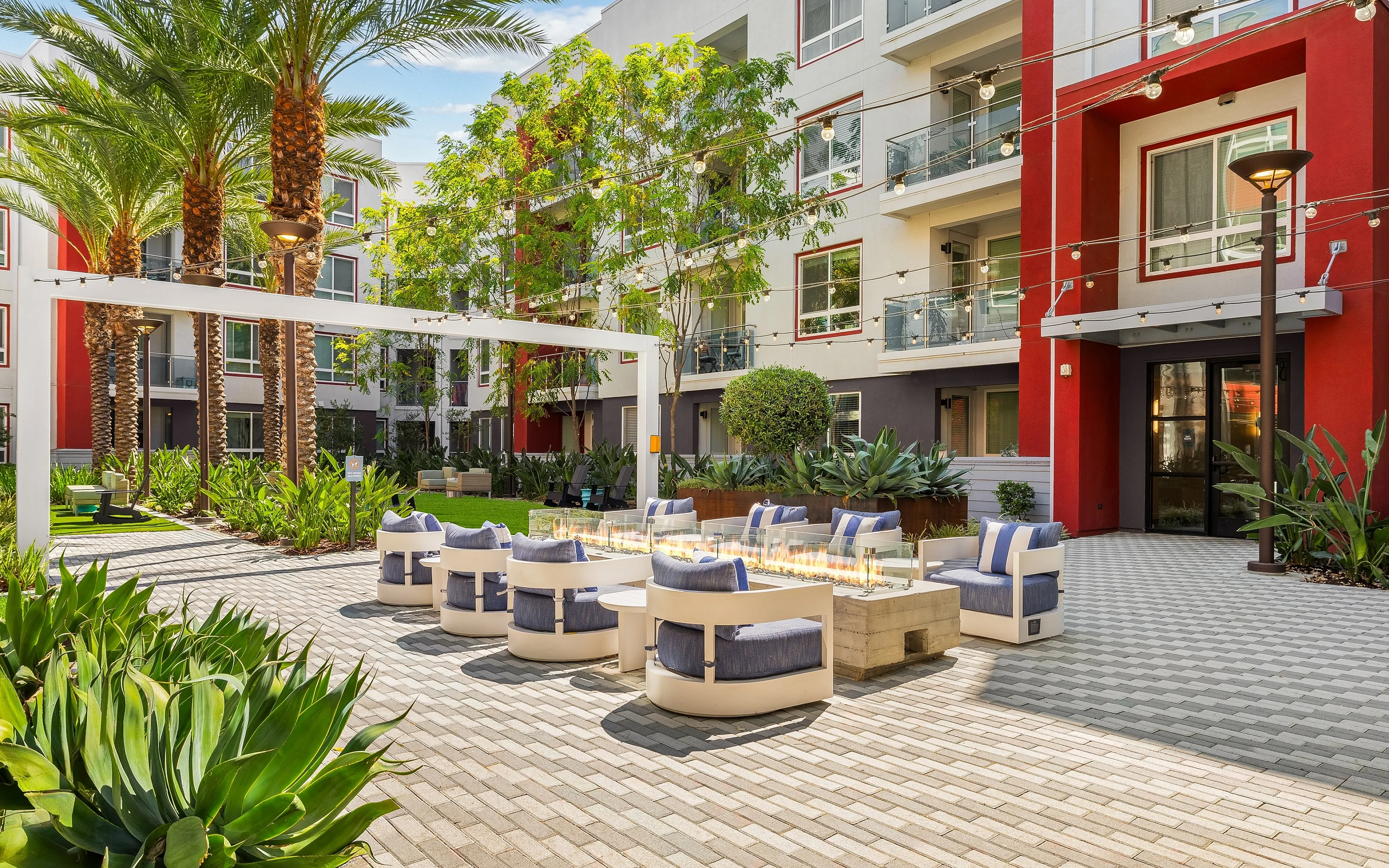 well manicured courtyard by pool