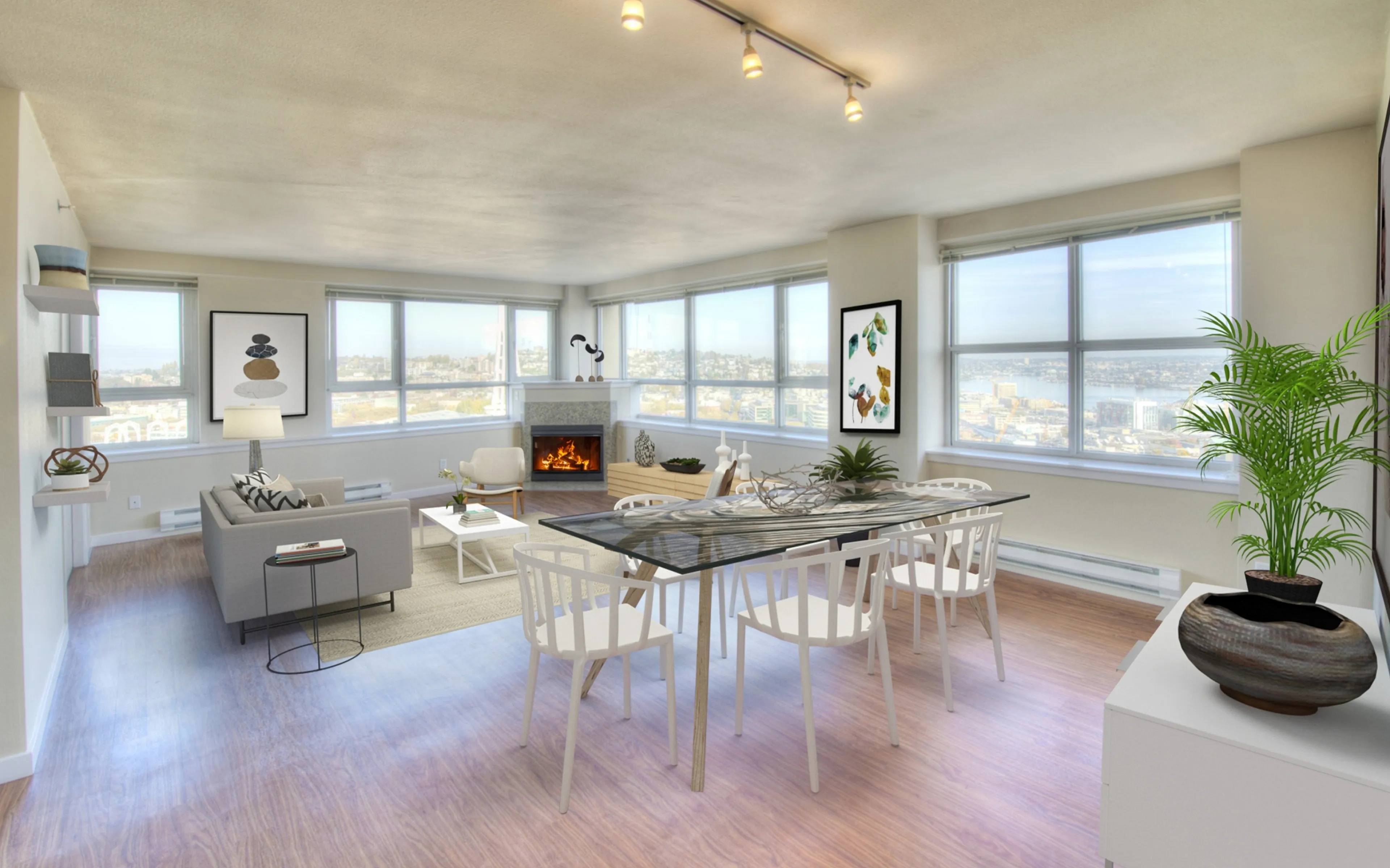 Bright and spacious open-plan living room and dining area featuring stunning city views, modern decor, and elegant hardwood flooring.