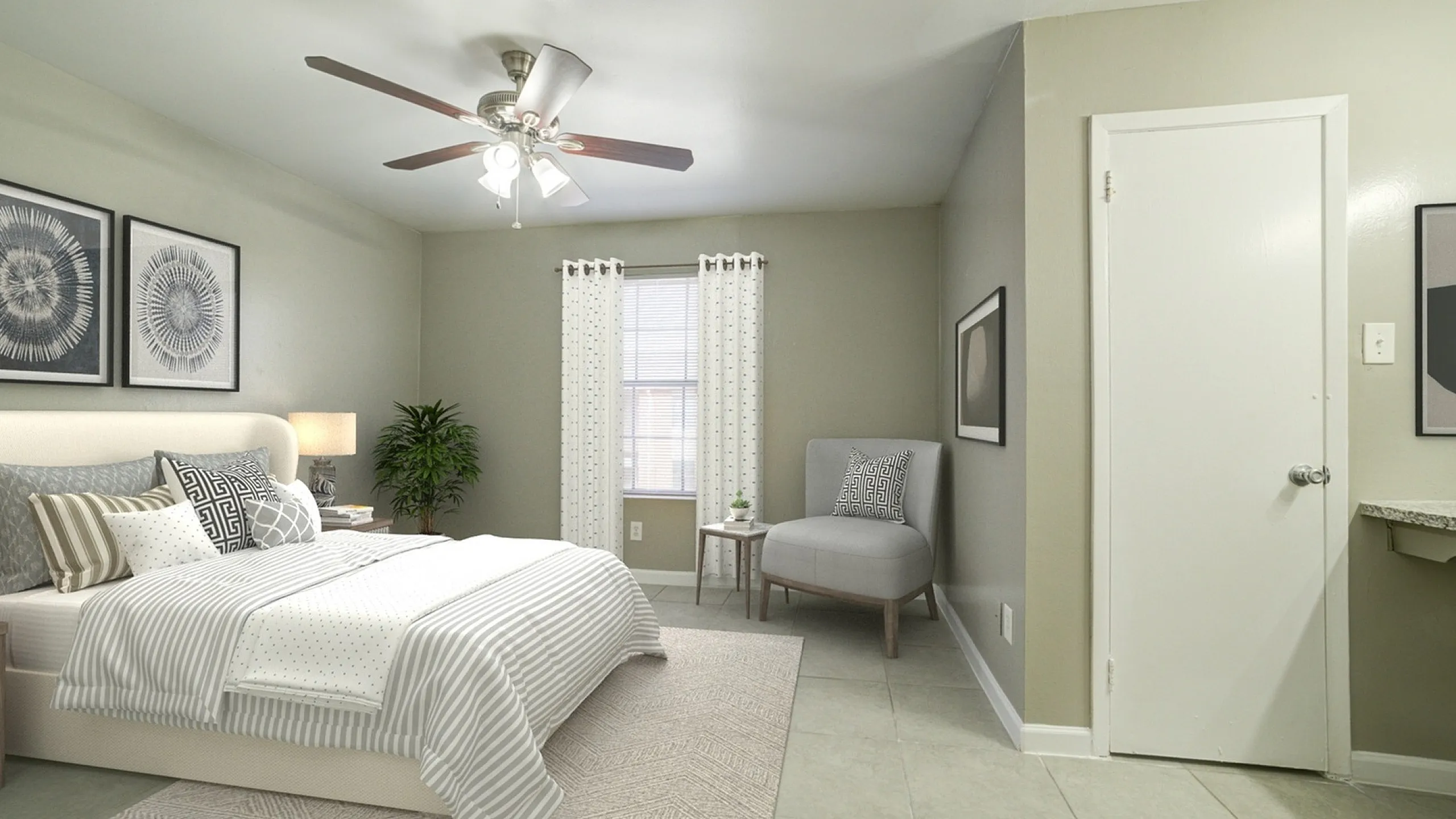 Inviting bedroom with elegant decor, featuring a cozy bed, stylish wall art, and a comfortable reading chair next to a window with natural light.