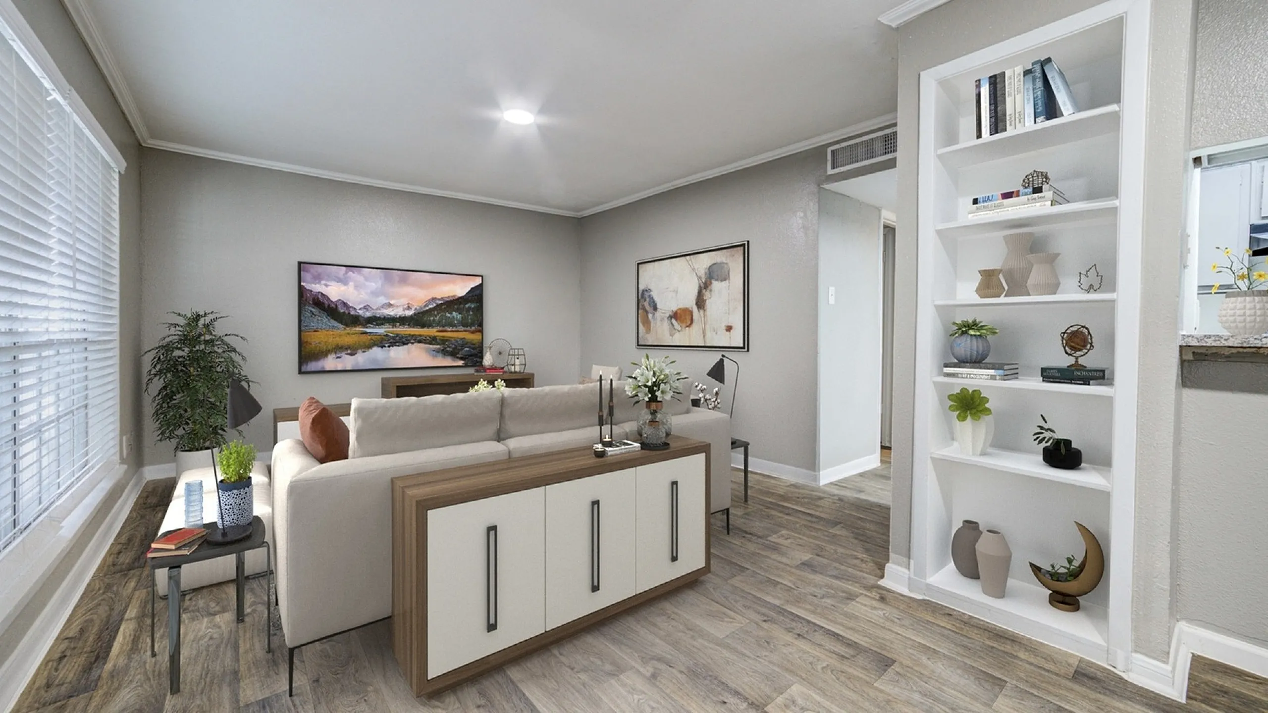 Elegant living room with modern decor, featuring a cozy sofa, stylish wooden cabinet, and built-in bookshelf for a chic aesthetic.