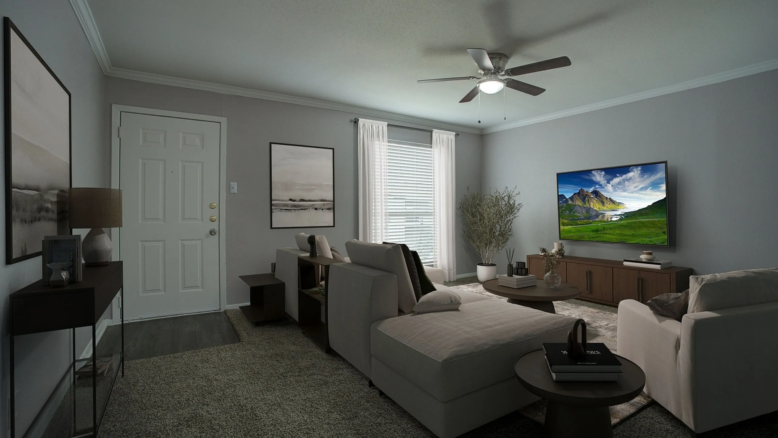 Modern living room with plush seating, elegant decor, and a large flat-screen TV, offering a cozy and inviting atmosphere.