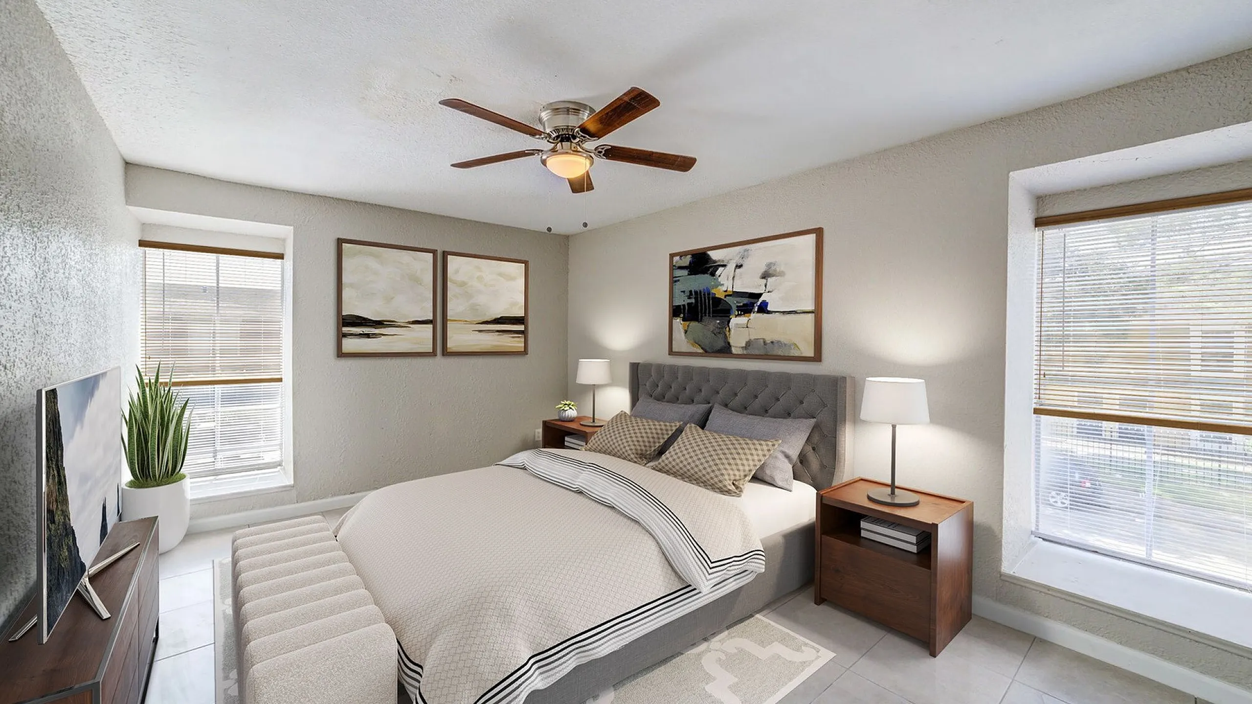 Inviting bedroom with modern decor, featuring a plush bed, elegant art, and abundant natural light from large windows.