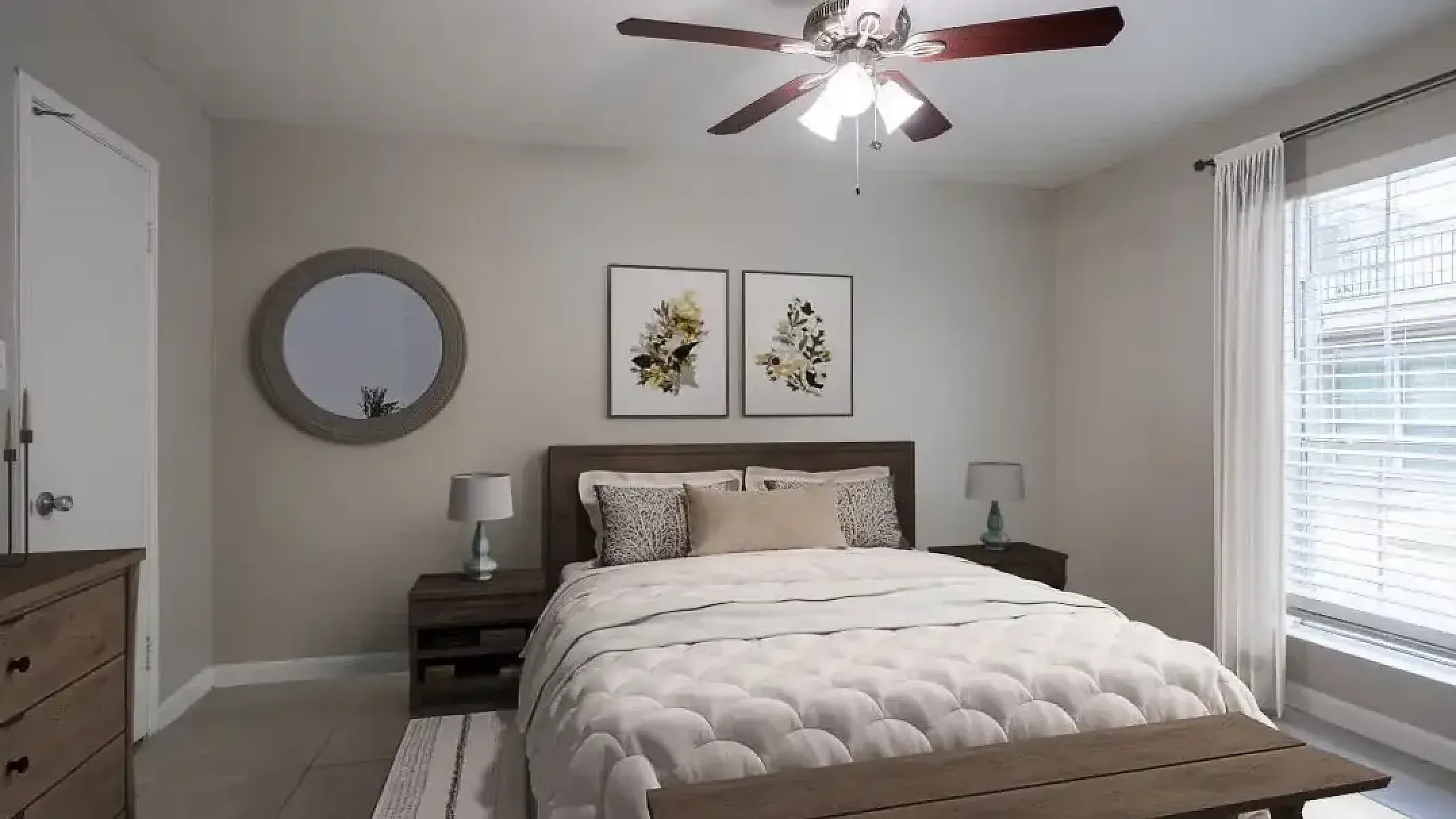 Charming bedroom with elegant decor, featuring a cozy bed, stylish wooden furniture, and large window for natural light.