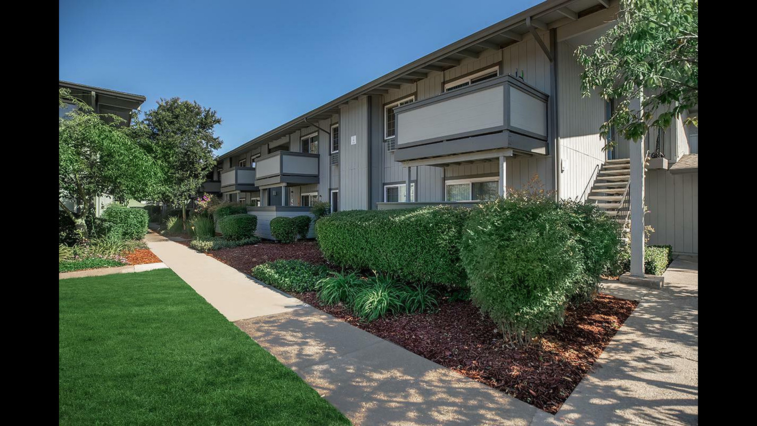 Creekside Apartments Building Exterior with Balconies