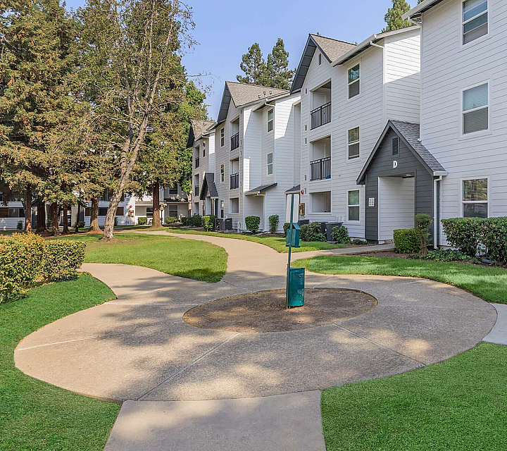 The Hazelwood Apartments Modern Building Exterior and Pet Waste Station Area