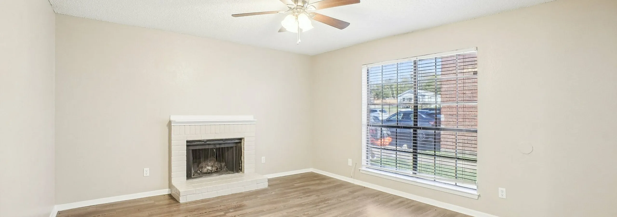 Renovated living room with fireplace at Chalk Gardens