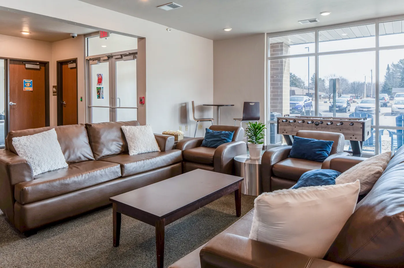 Inviting community lounge for students at Timberwolf Suites Student Living