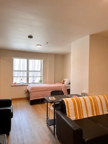 Model Unit Studio pictured is the unit from when you first walk in. included is the twin bed, desk and chair, lounge chair and couch!