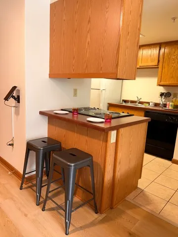 Kitchen-Model Unit fully furnished including the breakfast bar and stools, and kitchens with all appliances included
