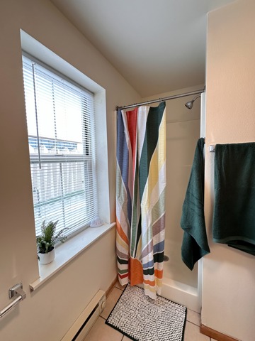 Bathroom-2 bedroom model unit 1 bathroom in 2 bedroom apartment including shower, toilet and sink