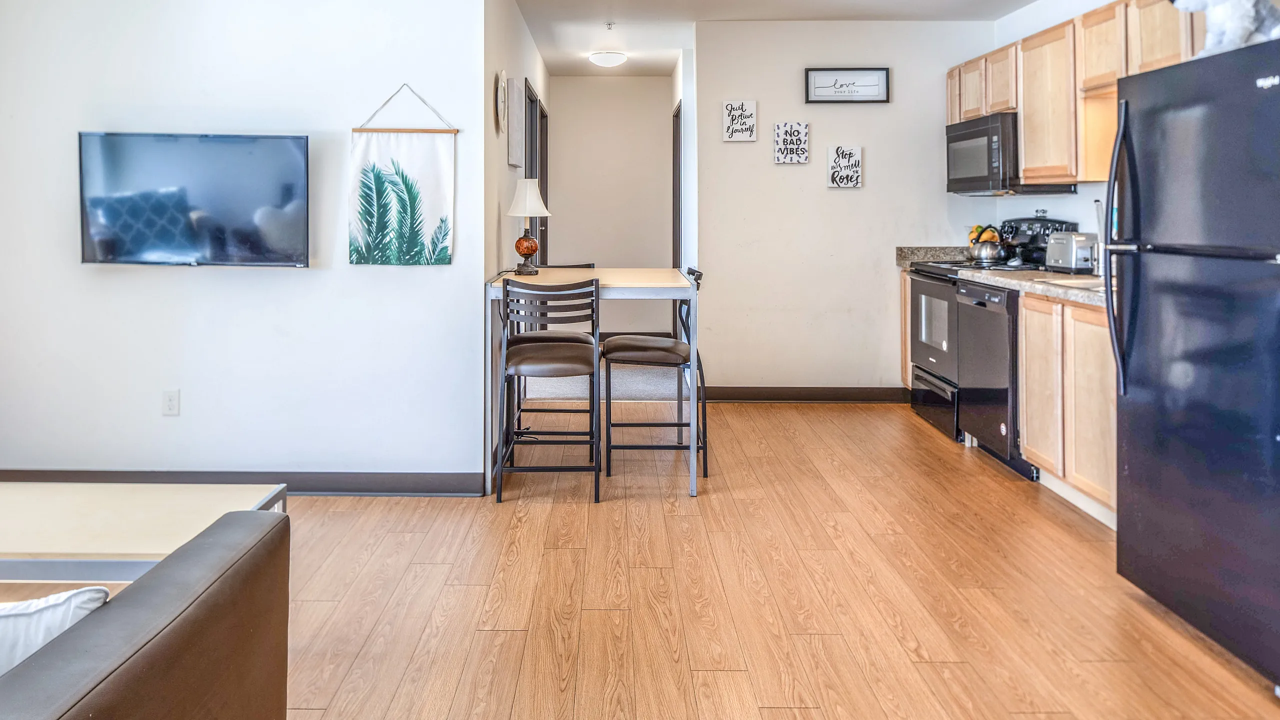 Updated kitchens, high-top table and fully furnished living room