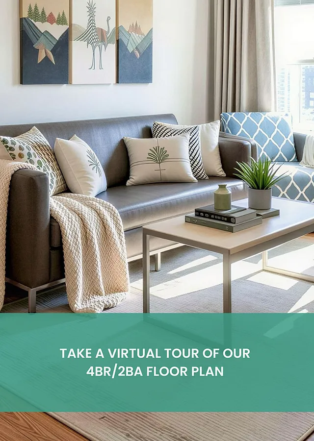 Inviting living room with modern decor, cozy gray sofa, stylish cushions, and vibrant wall art. Perfect blend of comfort and elegance.